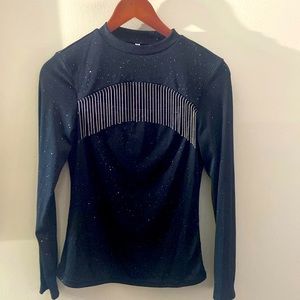 Black long sleeve ladies top size M great condition. Cut out in the front.